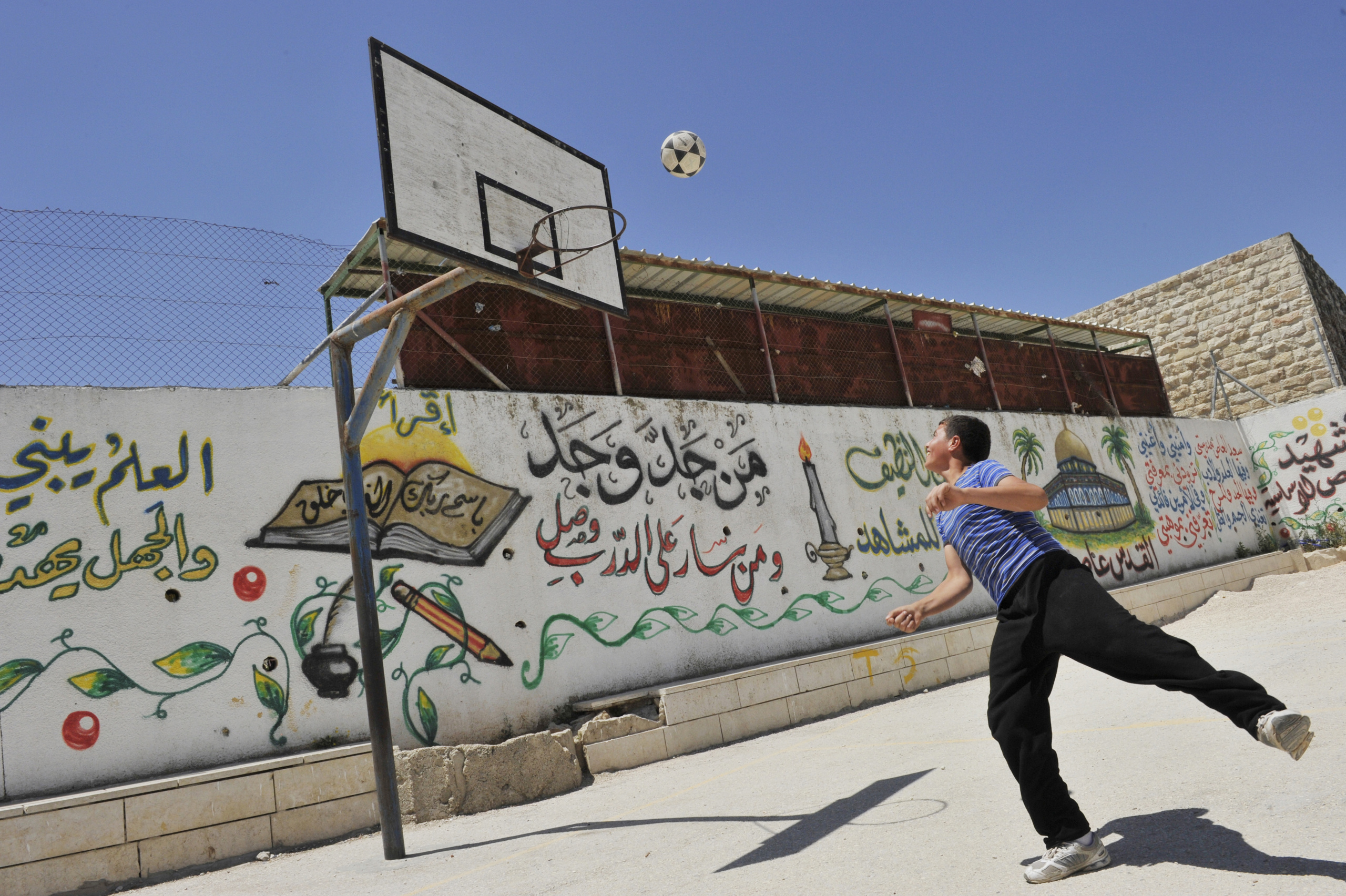 Picture taken for the International Basketball Foundation .
Hebron, Palestine.
The International Basketball Foundation (IBF) was founded in 2008 by FIBA.
This Foundation is the social, educational and legacy branch of FIBA to address the role of sport and basketball especially in society. The role of the Foundation is to preserve and promote the values of basketball and its cultural heritage.