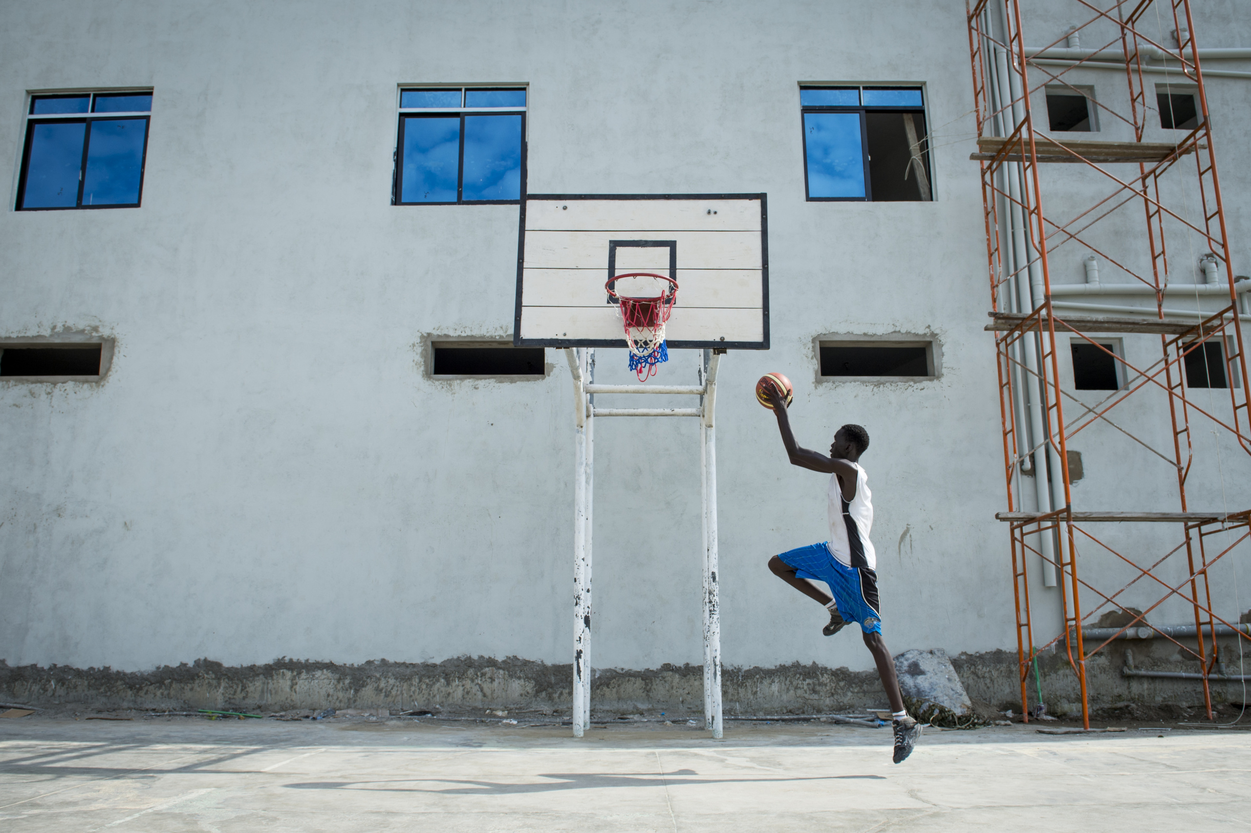 Picture taken for the International Basketball Foundation .
South-Sudan, Juba.
Nimra Talata stadium
The International Basketball Foundation (IBF) was founded in 2008 by FIBA.
This Foundation is the social, educational and legacy branch of FIBA to address the role of sport and basketball especially in society. The role of the Foundation is to preserve and promote the values of basketball and its cultural heritage.
