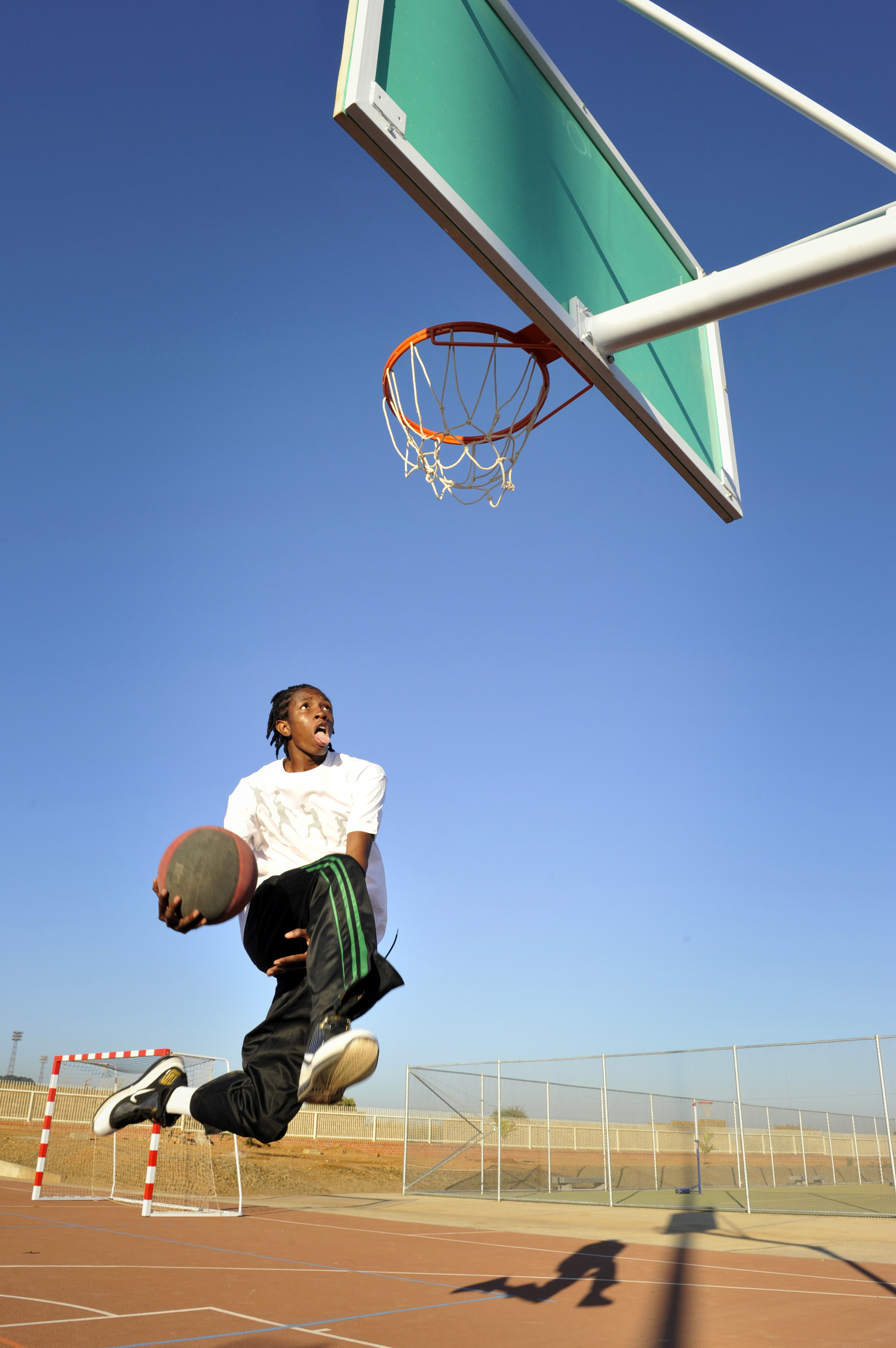 Picture taken for the International Basketball Foundation .
Lusaka, Zambia.
The International Basketball Foundation (IBF) was founded in 2008 by FIBA.
This Foundation is the social, educational and legacy branch of FIBA to address the role of sport and basketball especially in society. The role of the Foundation is to preserve and promote the values of basketball and its cultural heritage.