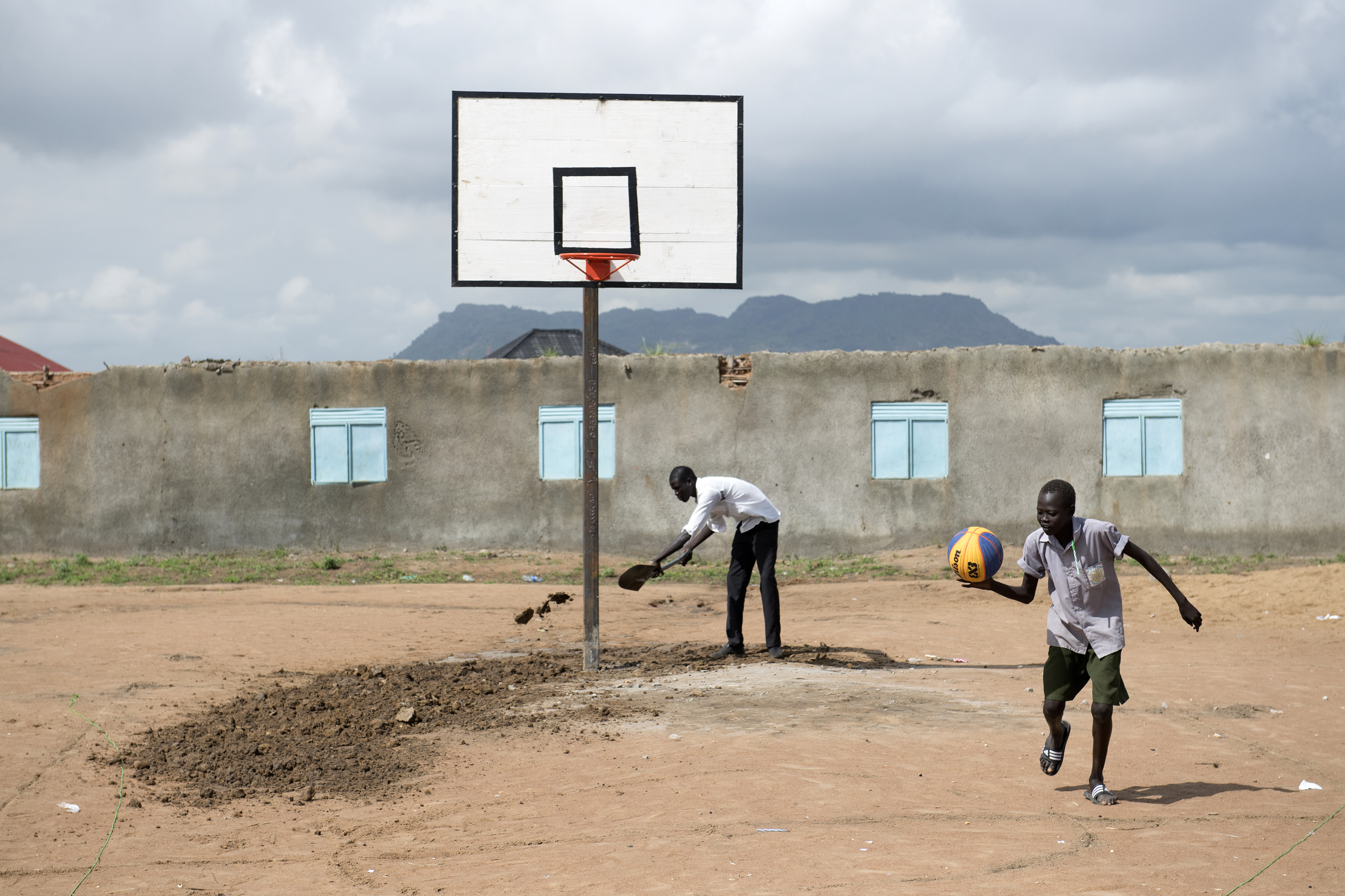 Juba, South Sudan.
A man prepare the field for basketball tournament.
The International Basketball Foundation (IBF) was founded in 2008 by FIBA.
This Foundation is the social, educational and legacy branch of FIBA to address the role of sport and basketball especially in society. The role of the Foundation is to preserve and promote the values of basketball and its cultural heritage.