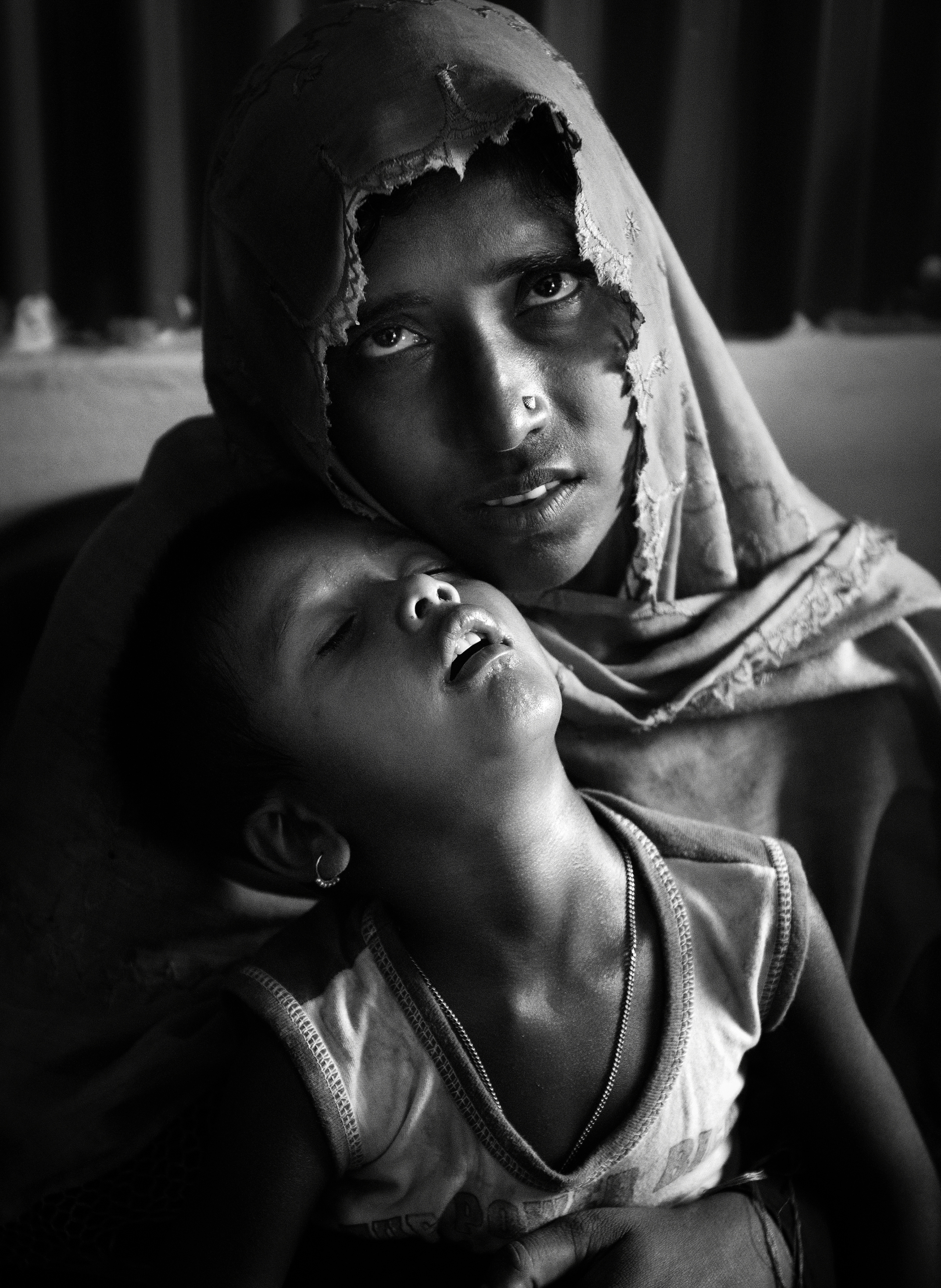 Bangladesh, Cox's Bazaar.
A woman in a psychological center holds her child in her arms. Her husband was killed in front of her by the Burmese army
Over 650,000 Rohingya have crossed the border to Bangladesh since August last year, fleeing the violence.