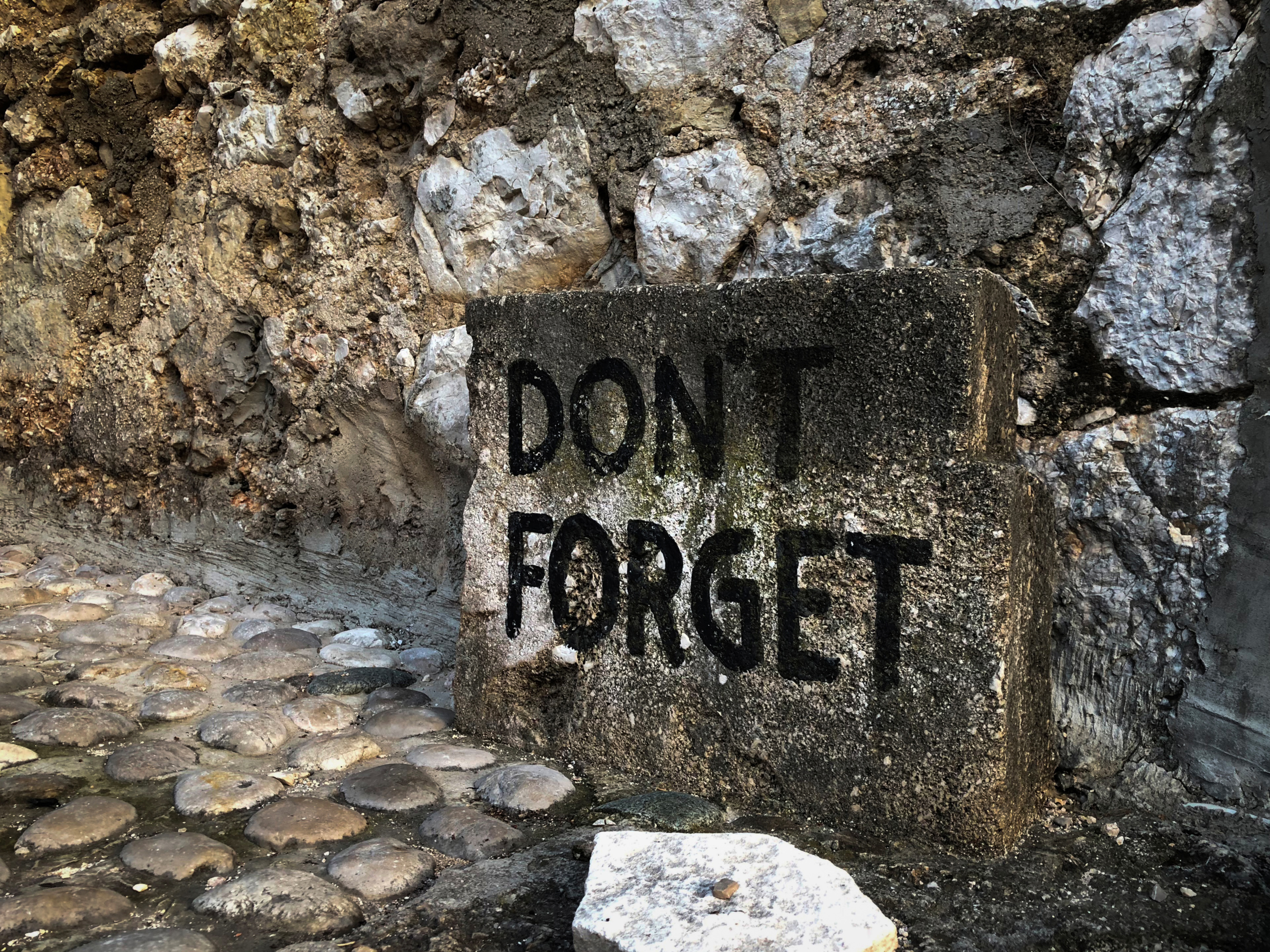 Mostar, Bosnia Herzegovina.
A 'Don't Forget Sign' is displayed as the city of Mostar remembers the 1993 conflict . The Siege of Mostar peaked in 1993 during the Croat-Bosniak conflict lasting eighteen months as fighting took place as Bosnia and Herzegovina declared independence from Yugoslavia. The city was divided in half between the two battling armies. Mostar, dating back over four hundred years, was mostly destroyed through the fighting. Although reconstruction has slowly commenced in the last decades, evidence of the war remains in bullet ravaged buildings still standing throughout the city. The Siege of Mostar reached its peak and more cruent time during 1993. Initially, it involved the Croatian Defence Council (HVO) and the 4th Corps of the ARBiH fighting against the Yugoslav People's Army (JNA) later Croats and Muslim Bosnian began to fight amongst each other, it ended with Bosnia and Herzegovina declaring independence from Yugoslavia.