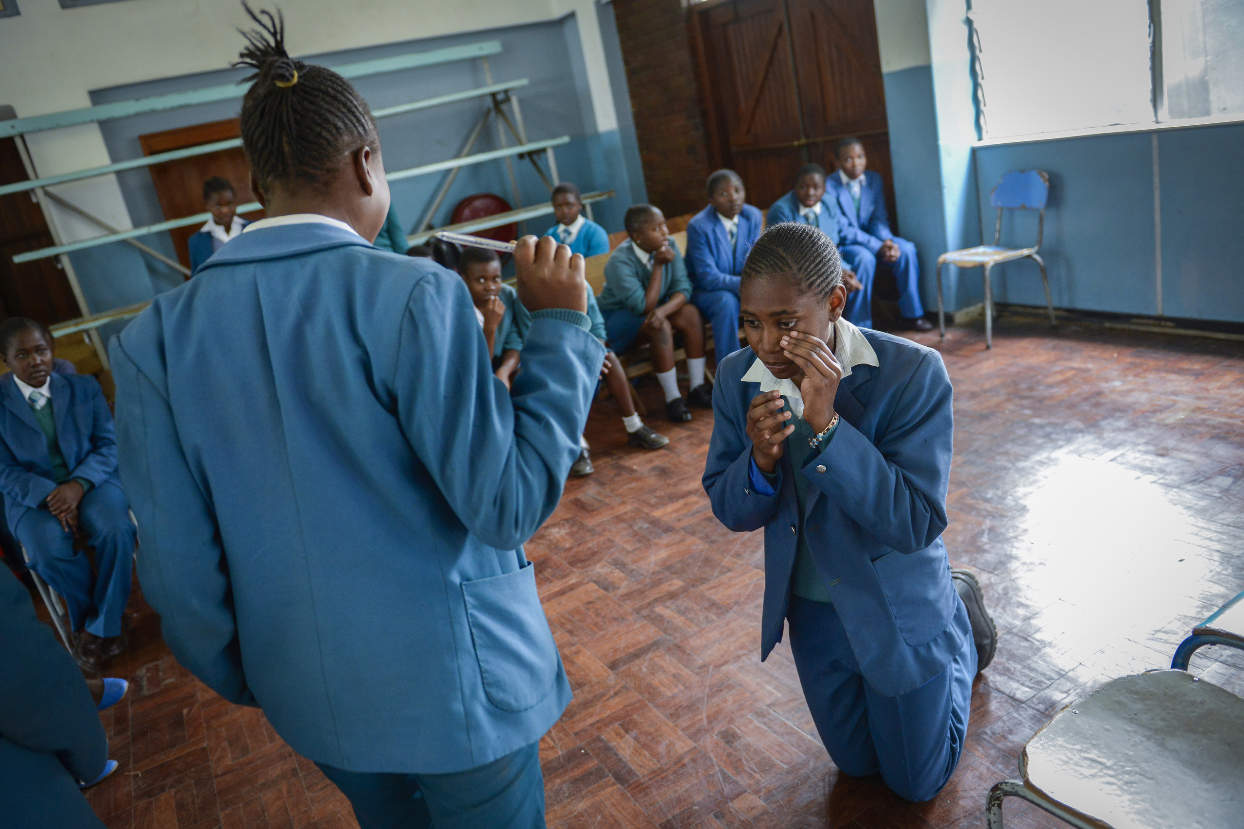 Zimbabwe,Harare.
Student at school in Harare. Zimbabwe recorded the oldest average age for victims of abuse and violence in schools in the study (just over 14 years of age on average). Most of these children were reported to be female . In Zimbabwe the most incidents of violence and abuse in schools that were reported to the child helpline involved physical abuse: the top two most common incidents reported were slaps/kicks and physical abuse, with a cane/belt/ruler.
