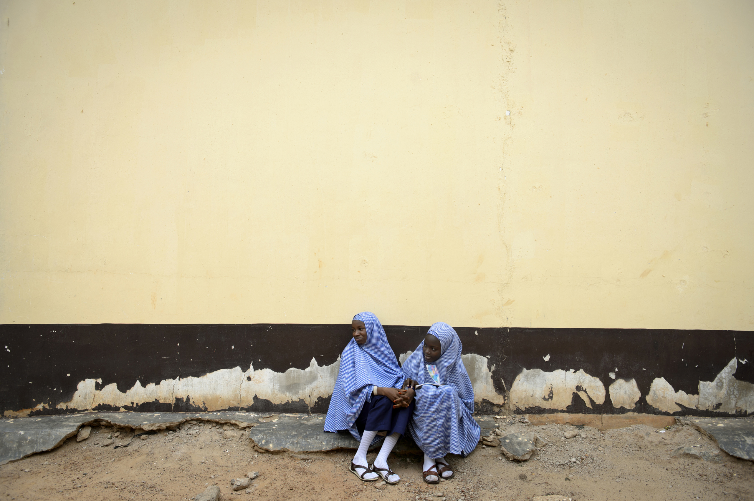 NIGERIA,Kaduna.
Two girls in an interdenominational school of Kaduna.
Nearly 4,000 people have died in Nigeria due to the violent conflict over the past decade.
The economic and ethnic conflict in the northern states has a religious dimension. It is only with true governance that these conflicting differences could be managed. As elsewhere in Nigeria, residents accuse both local and state government officials for promoting identity-based divisions to advance their own political agendas.
