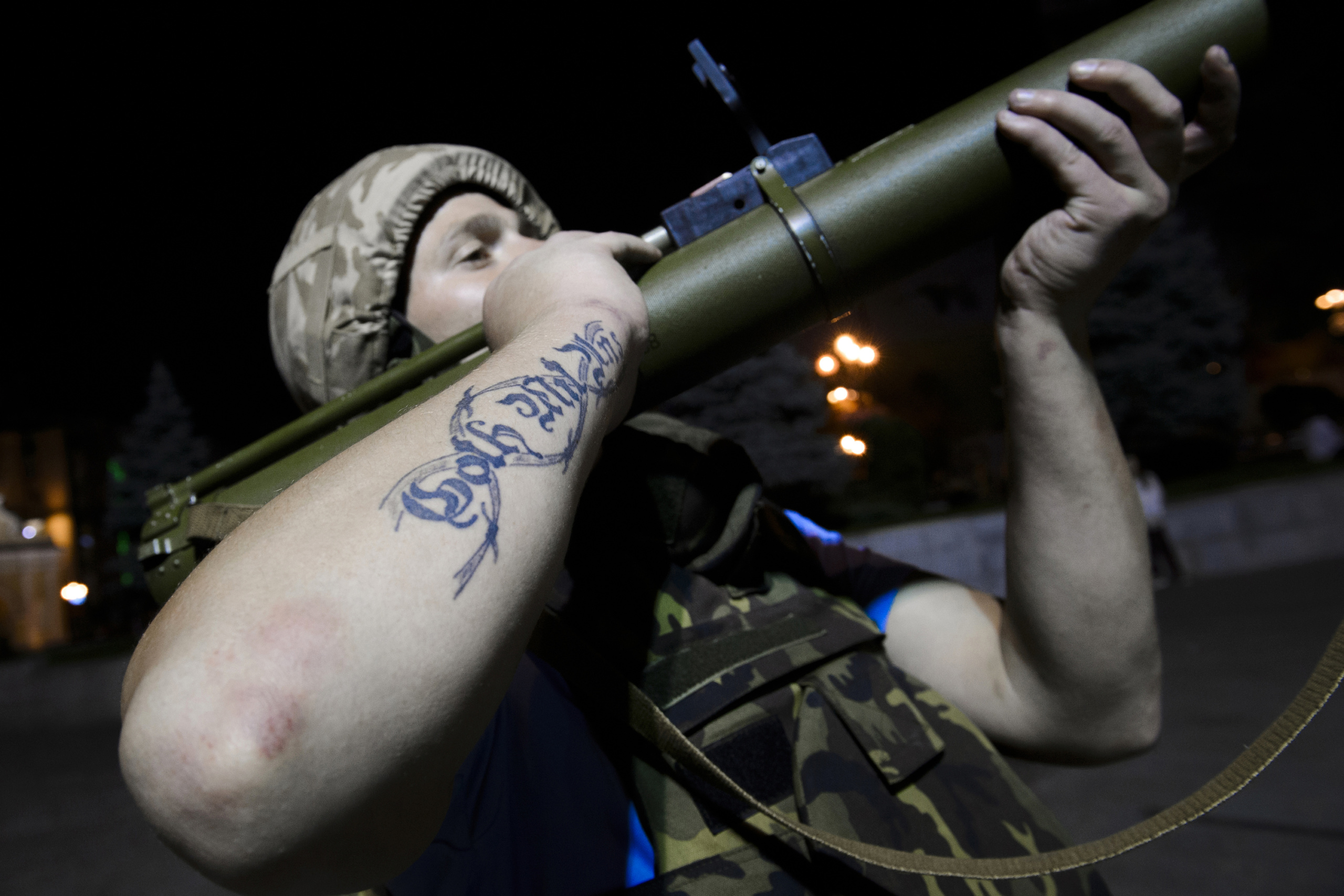 Kiev-Ukraine.
A nationalist militant explains handling a rocket launcher.
The fight between pro-Ukrainian troops and pro-Russian separatists is continuing in the Donbas region of eastern Ukraine despite the recent Minsk ceasefire agreements.