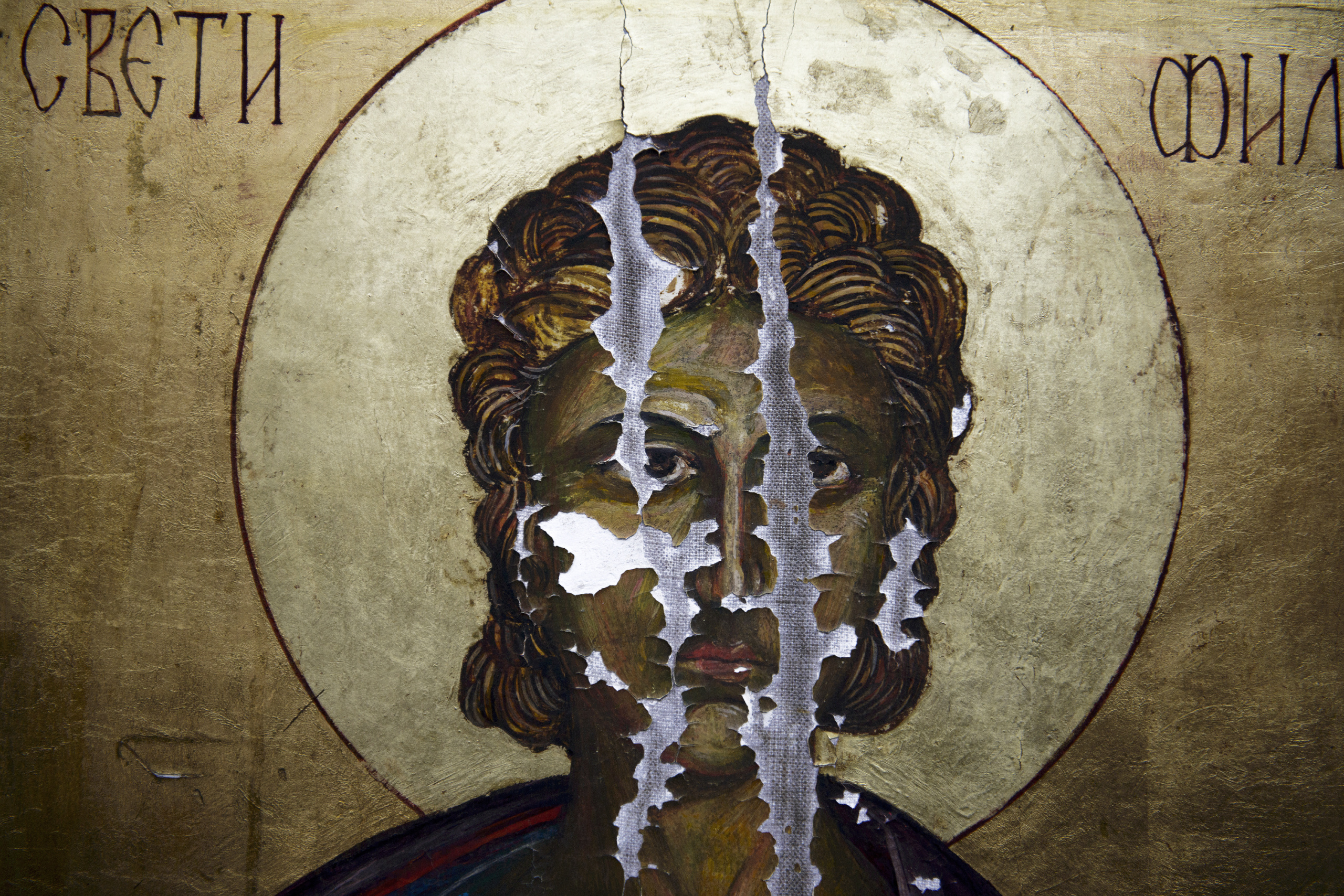 A picture taken on May 2014,shows a damaged icon in a monastery at Skopje Macedonia.