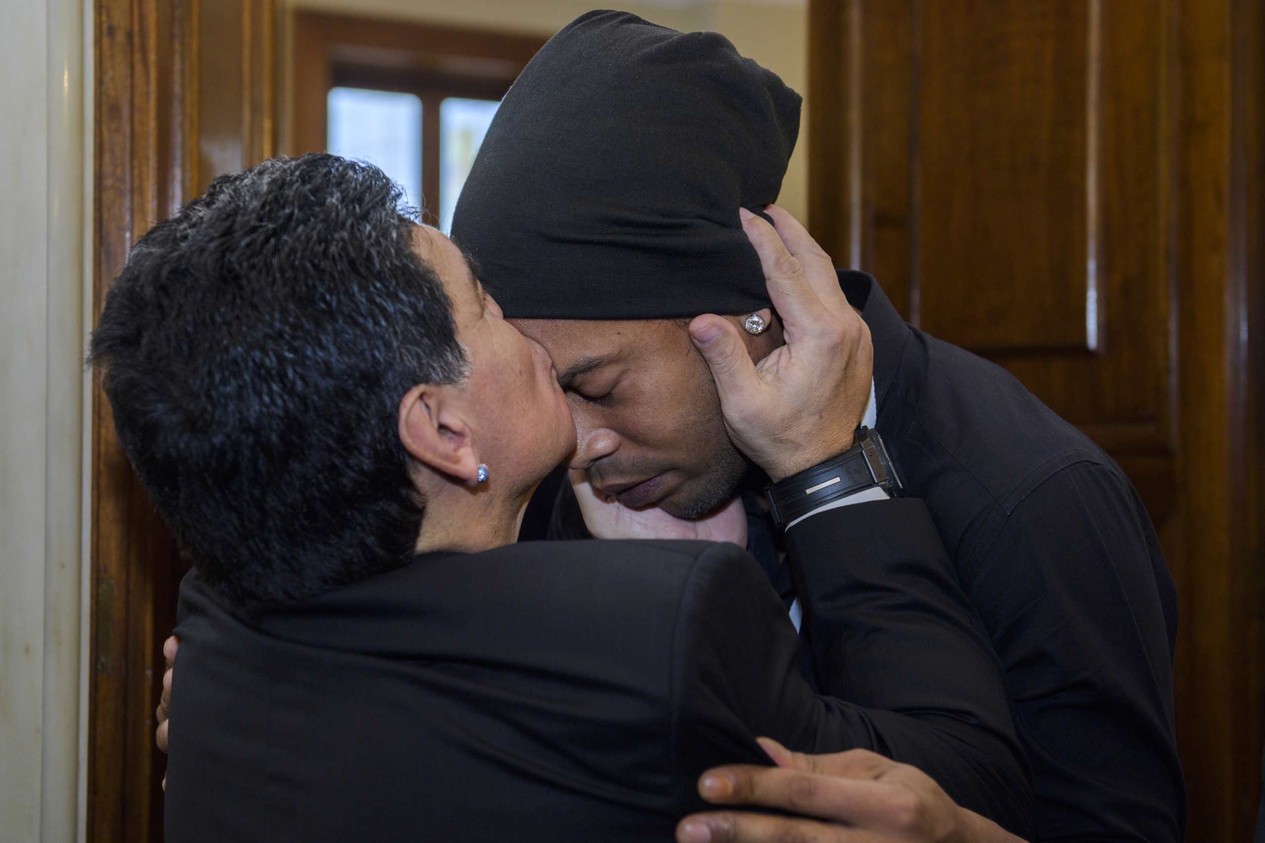 Former soccer star Diego Maradona (L) kisses Ronaldinho's forehead after special audience with Pope Francis held before a special "Match for Peace". Current and former soccer stars representing various religious faiths participated in the "Match for Peace", which was held in the Stadio Olimpico in Rome.