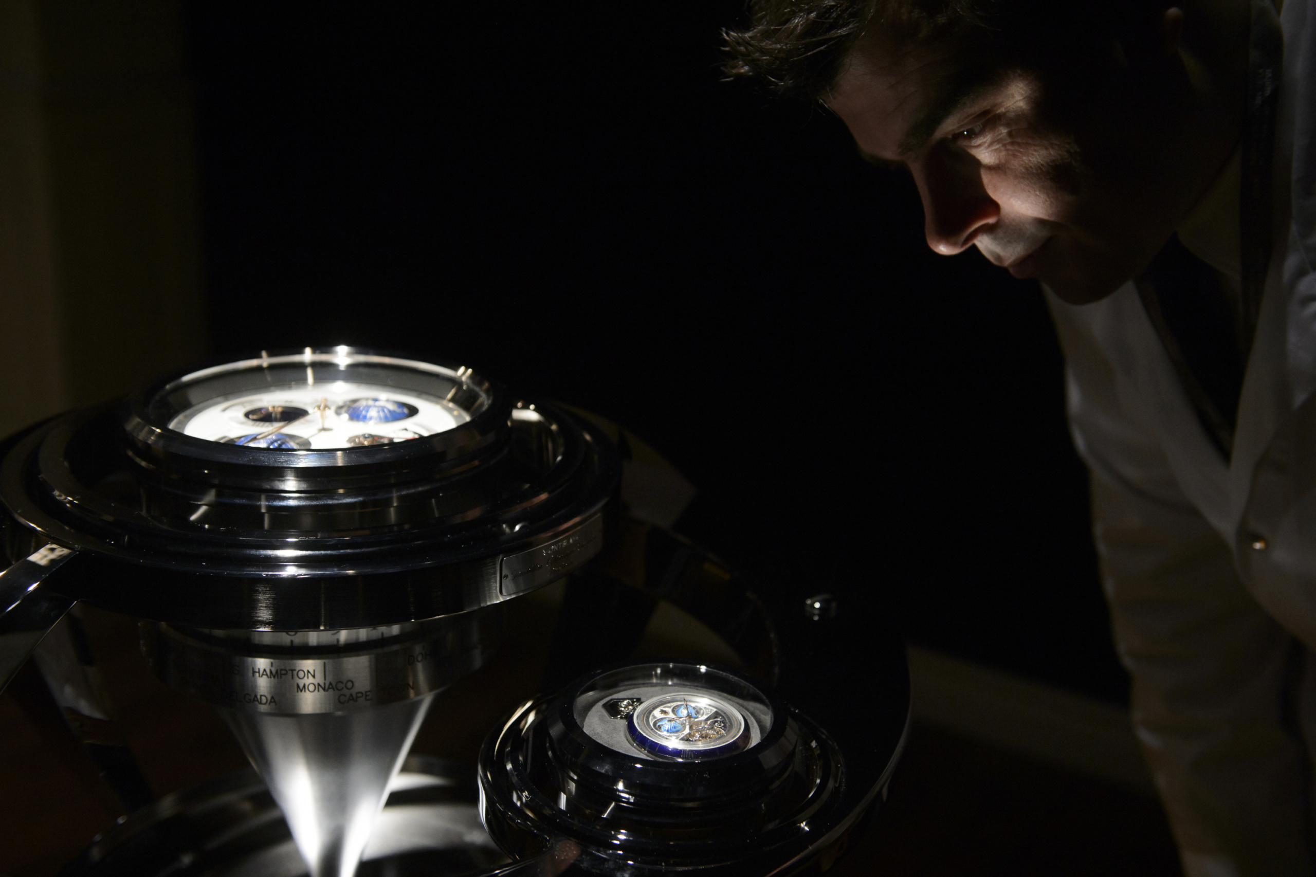 A man looks at a Montblanc watch, part of Switzerland-based luxury goods holding company Richemont, during the opening day of the 'Salon International de la Haute Horlogerie' (SIHH), a professional fair in fine watchmaking, on January 18, 2016. / AFP / Richard Juilliart (Photo credit should read RICHARD JUILLIART/AFP/Getty Images)
