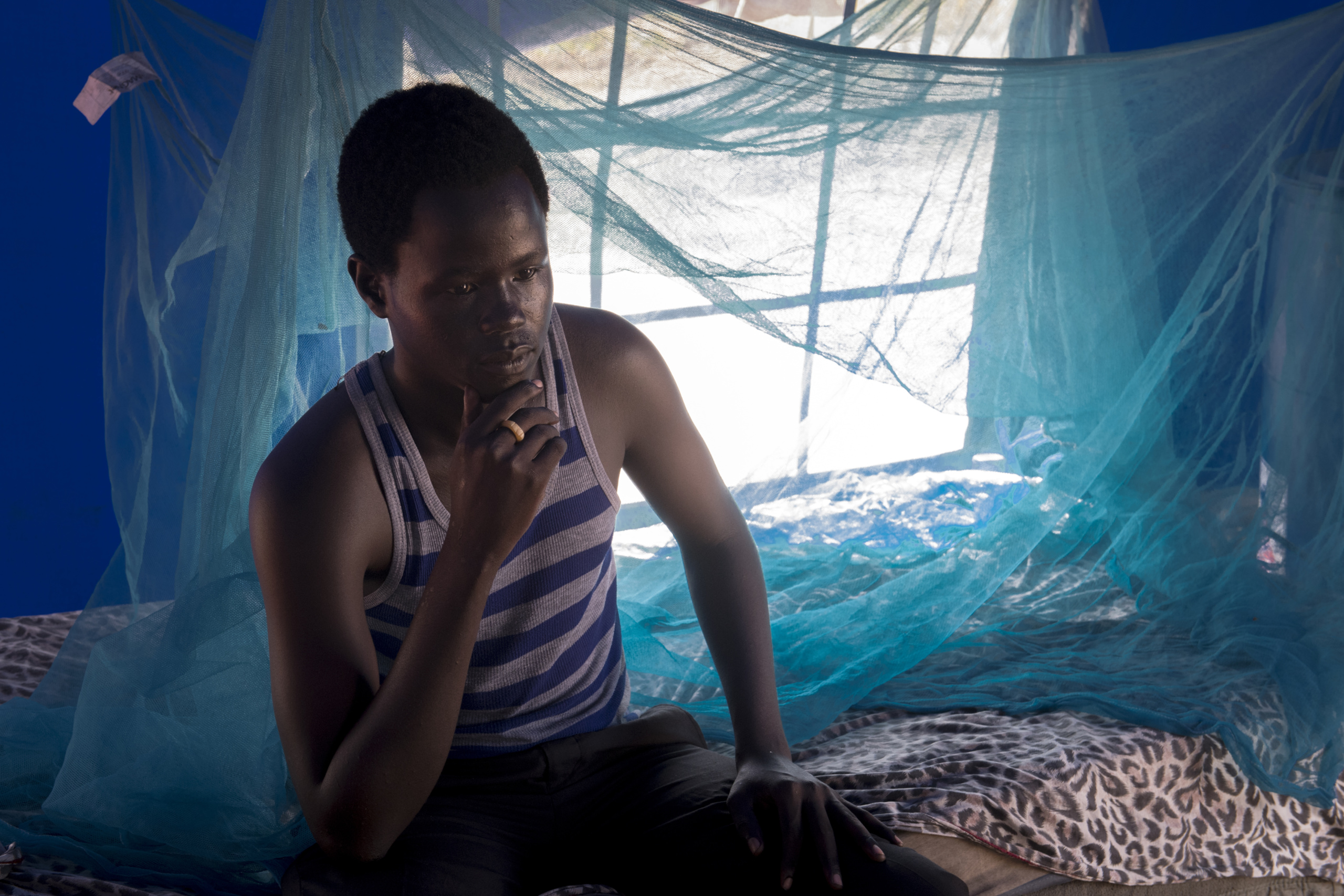 South Sudan, Juba.
Portrait of a civil war refugee.
The South Sudanese civil war is an armed conflict between the supporters of President Salva Kiir and those of Vice President Riek Machar since 15 December 2013 in South Sudan. This rivalry brings to light old divisions between the various clans of the Sudan People's Liberation Movement, the former rebellion that led the country to independence in 2011, against a background of ethnic rivalry: on the one hand, the Dinkas (majority ethnic group Of Salva Kiir) and on the other the Nuers (Riek Machar ethnic group).
"You are Nuer, we are going to kill you. I lost my parents they were killed by soldiers. Every night, when I am hearing gun shots I am all the time thinking they are coming in the camp to kill all of us"
