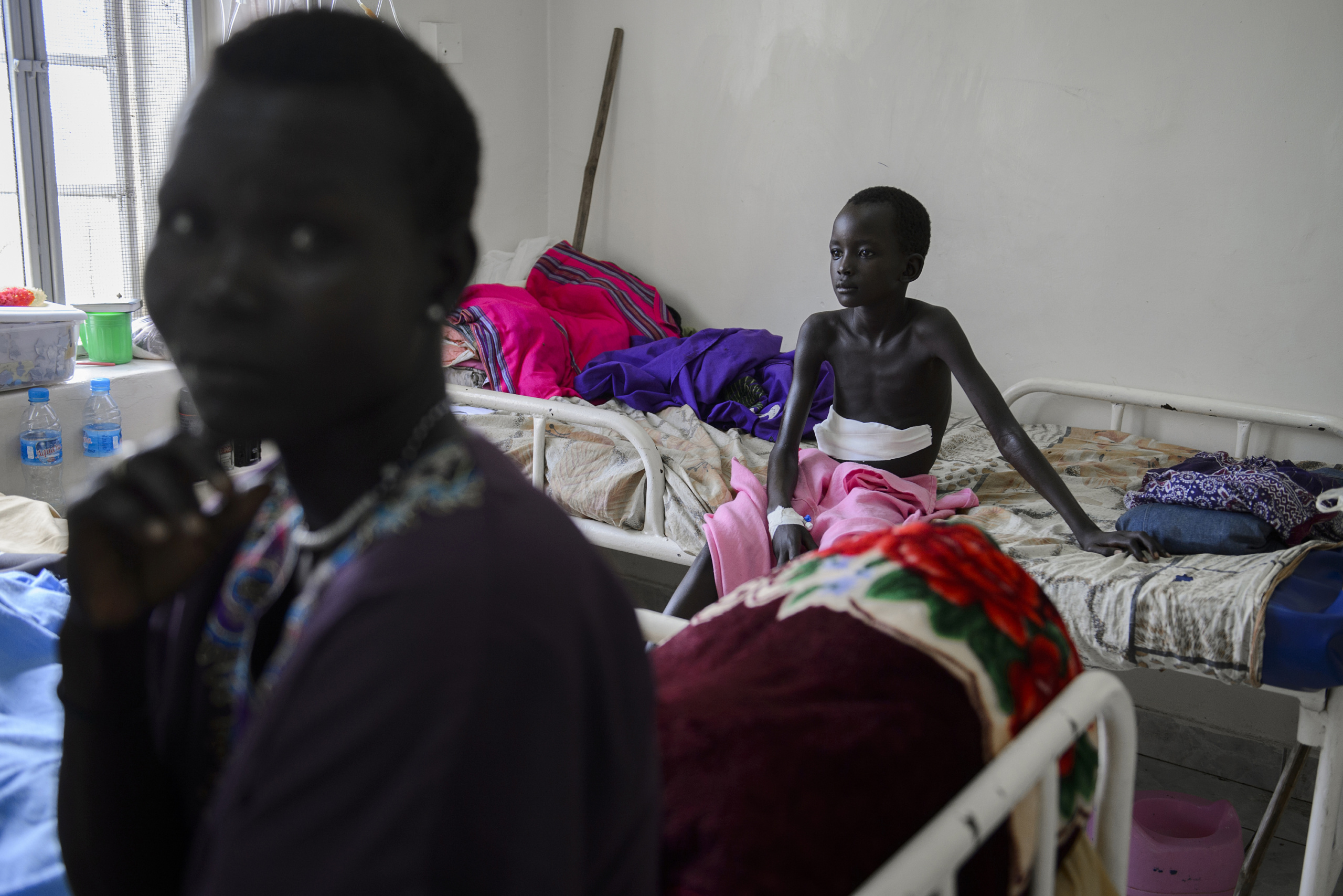 — SOUTH SUDAN
A Child wounded by bullet .
On 9th of July 2011 a new country will be born in Africa. The Republic of South Sudan will be the 54th African state and the 193rd nation in the world. But South Sudan is a very poor country, despite its large oil reserves, which account for 98 percent of its income.
South Sudan’s economy is mainly pastoral, and cattle herding is the most important activity. Agriculture and fishery are comparatively sparse, although the Nile runs through the region.
South Sudan’s society is deeply divided along tribal lines. The main clan is the Dinka, a pastoral semi-nomadic population. Violence is endemic to the region, often as a consequences of cattle ownership issues. But violence is also very much fed by the uncountable number of weapons circulating in the country, the heavy legacy of a 30 year long civil war against North Sudan.