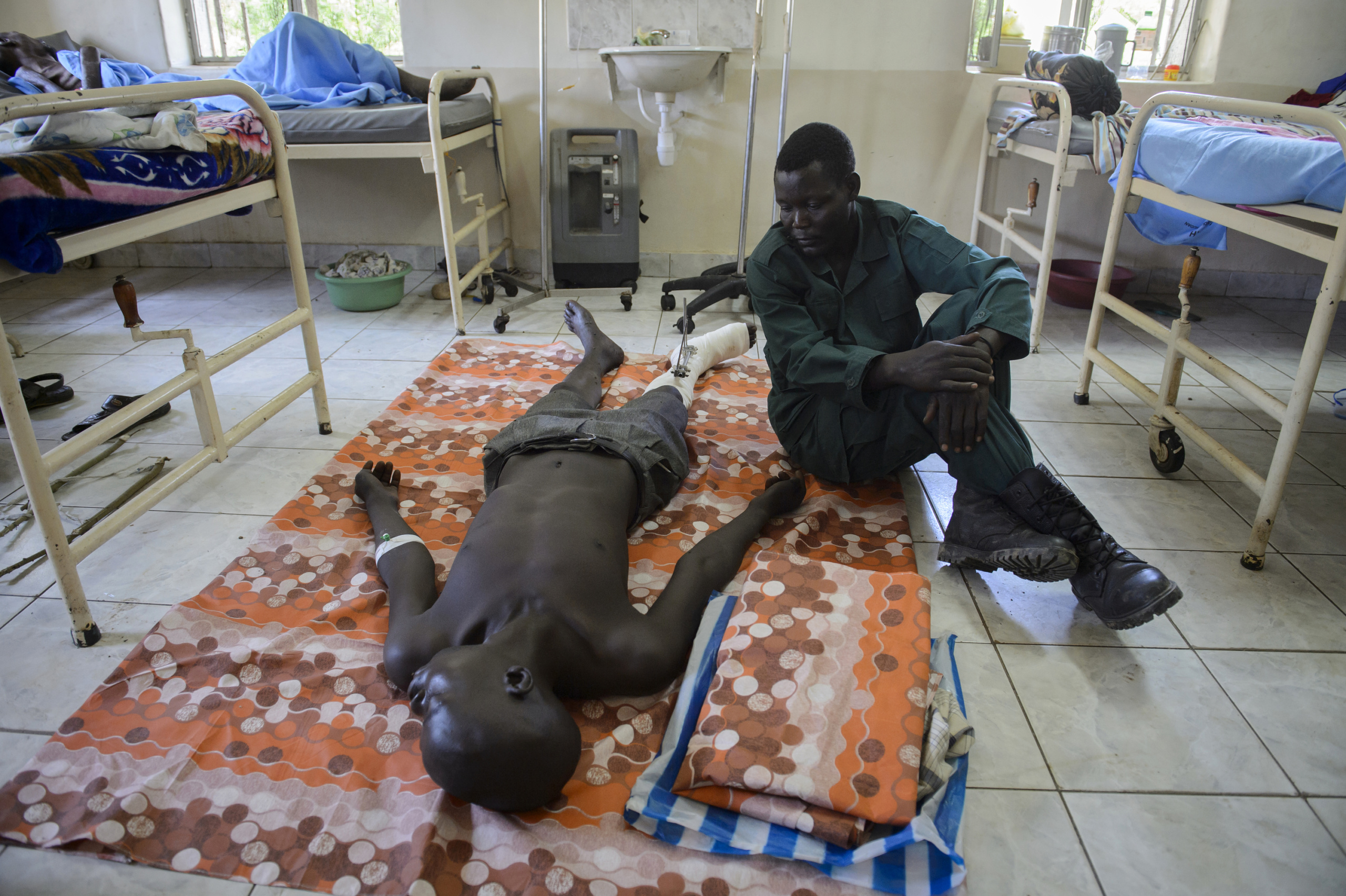 — SOUTH SUDAN
Juba, South Sudan.
A military wounded by bullet .
On 9th of July 2011 a new country will be born in Africa. The Republic of South Sudan will be the 54th African state and the 193rd nation in the world. But South Sudan is a very poor country, despite its large oil reserves, which account for 98 percent of its income.
South Sudan’s society is deeply divided along tribal lines. The main clan is the Dinka, a pastoral semi-nomadic population. Violence is endemic to the region, often as a consequences of cattle ownership issues. But violence is also very much fed by the uncountable number of weapons circulating in the country, the heavy legacy of a 30 year long civil war against North Sudan.