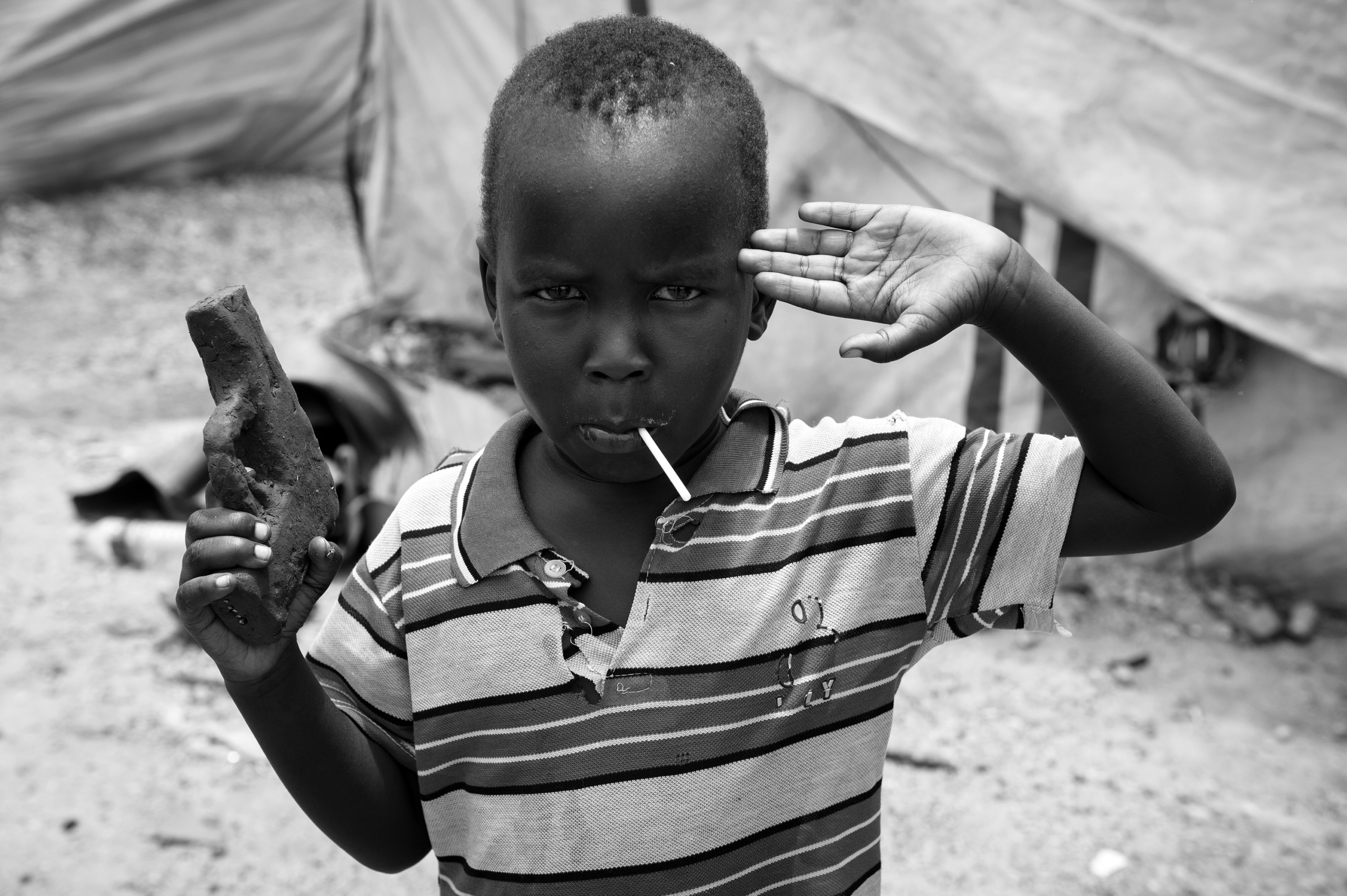 — SOUTH SUDAN
Juba, South Sudan.
Displaced persons from Dinka ethnic group are sheltered in a refugee camp under control of UN at Juba.
On 9th of July 2011 a new country will be born in Africa. The Republic of South Sudan will be the 54th African state and the 193rd nation in the world. But South Sudan is a very poor country, despite its large oil reserves, which account for 98 percent of its income.
South Sudan’s society is deeply divided along tribal lines. The main clan is the Dinka, a pastoral semi-nomadic population. Violence is endemic to the region, often as a consequences of cattle ownership issues. But violence is also very much fed by the uncountable number of weapons circulating in the country, the heavy legacy of a 30 year long civil war against North Sudan.