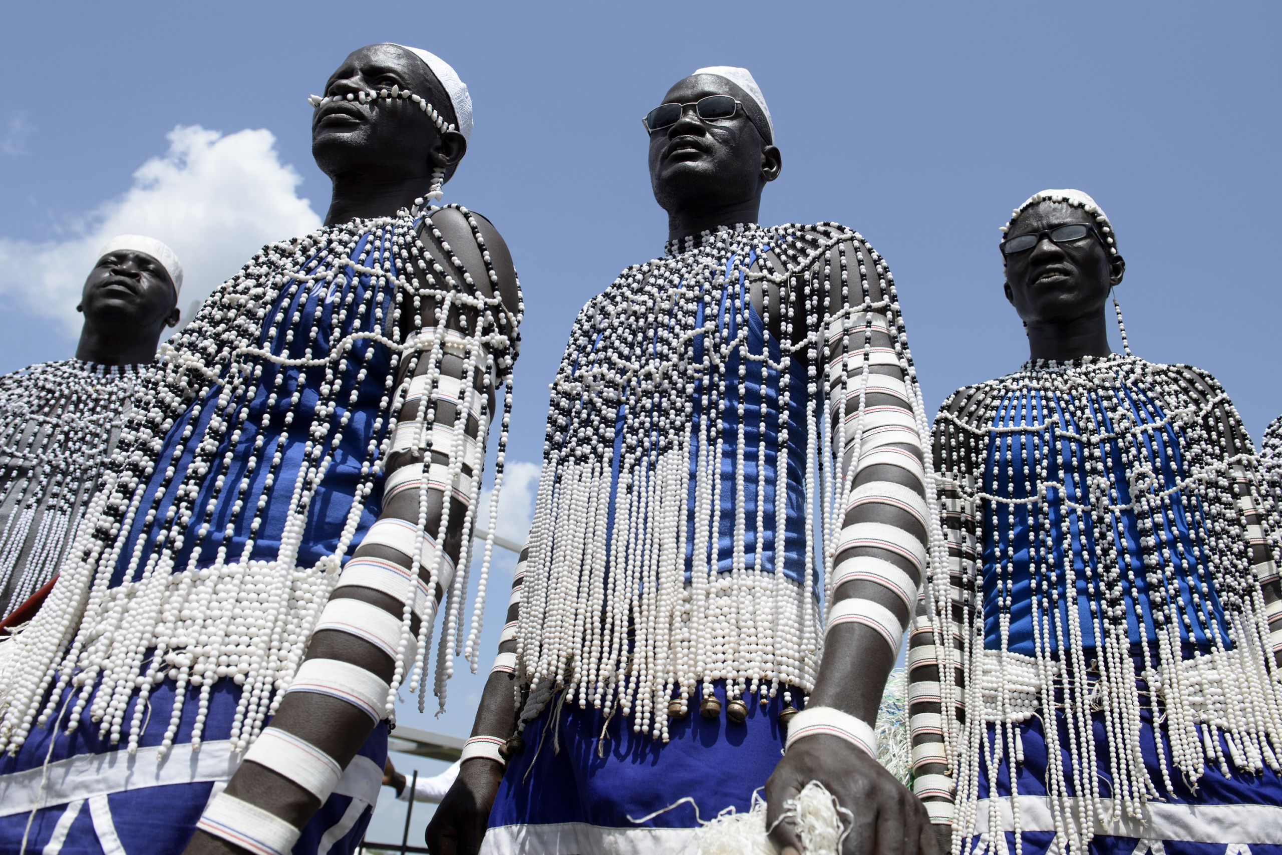 — SOUTH SUDAN
Juba, South Sudan.
South Sudanese tribal performers get ready to parade during South Sudan's Independence day,
On 9th of July 2011 a new country will be born in Africa. The Republic of South Sudan will be the 54th African state and the 193rd nation in the world. But South Sudan is a very poor country, despite its large oil reserves, which account for 98 percent of its income.
South Sudan’s society is deeply divided along tribal lines. The main clan is the Dinka, a pastoral semi-nomadic population. Violence is endemic to the region, often as a consequences of cattle ownership issues. But violence is also very much fed by the uncountable number of weapons circulating in the country, the heavy legacy of a 30 year long civil war against North Sudan.