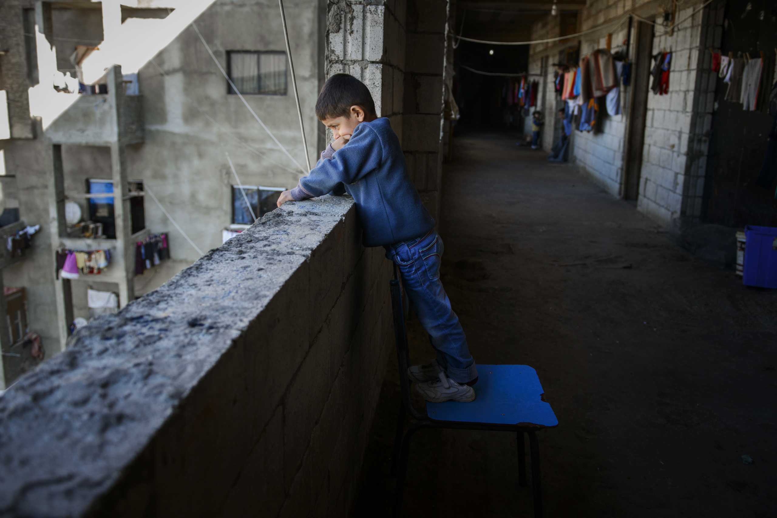 Saida-Lebanon.
Young child on an abandoned construction site occupied by Syrian refugees. This building, referred to as a “collective shelter”, is owned by the Islamic University and financed by a Kuwaiti association. About 150 families live within it, all from the Syrian Daraa region. The refugees try to survive through public subsidies and underpaid labor.
the Lebanese government will not allow traditional refugee camps in Lebanon, refugees are finding unusual places to live across the country, including unfinished homes, abandoned shopping malls and schools .......