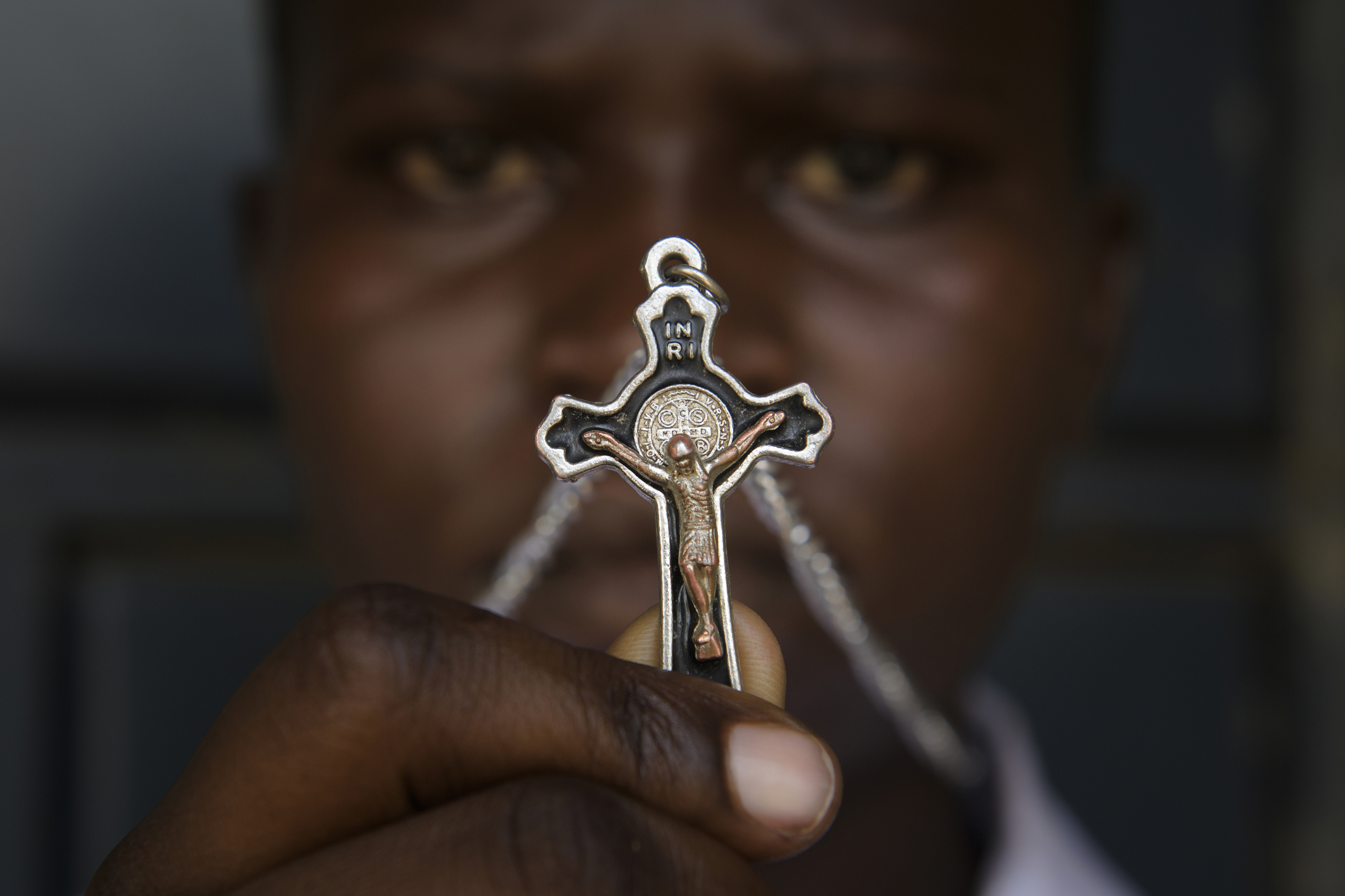 Soroti,UGANDA.
Religious conflict
Light Senior Secondary School.
Report about Violence among the Kuman, Ties and Karamonjon.
A woman displaying a Catholic cross.
