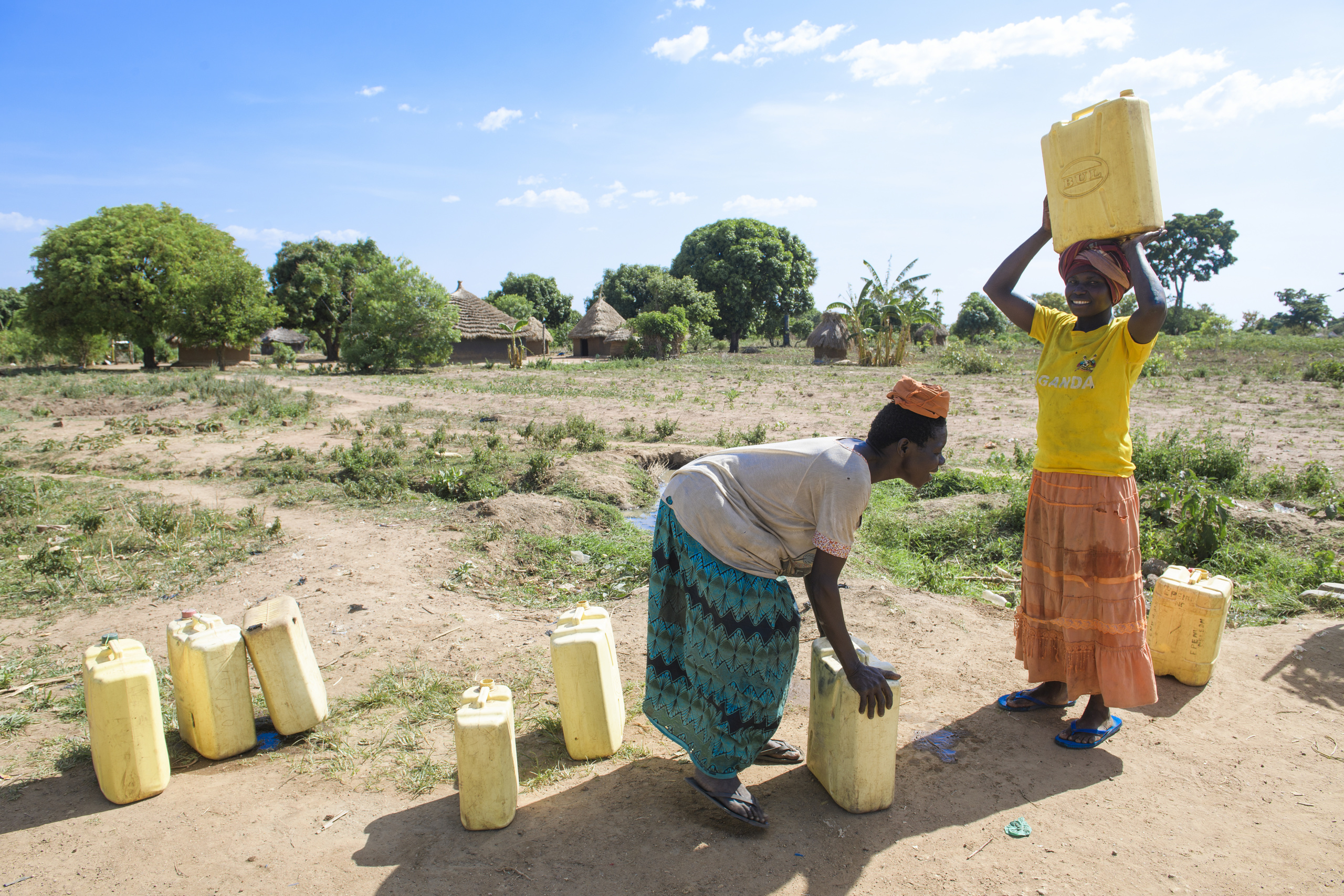 Soroti Uganda.
Women carrying water canisters on their head.
In Ugandan society bringing water home is considered a woman’s job and as such most men refuse to undertake this task.