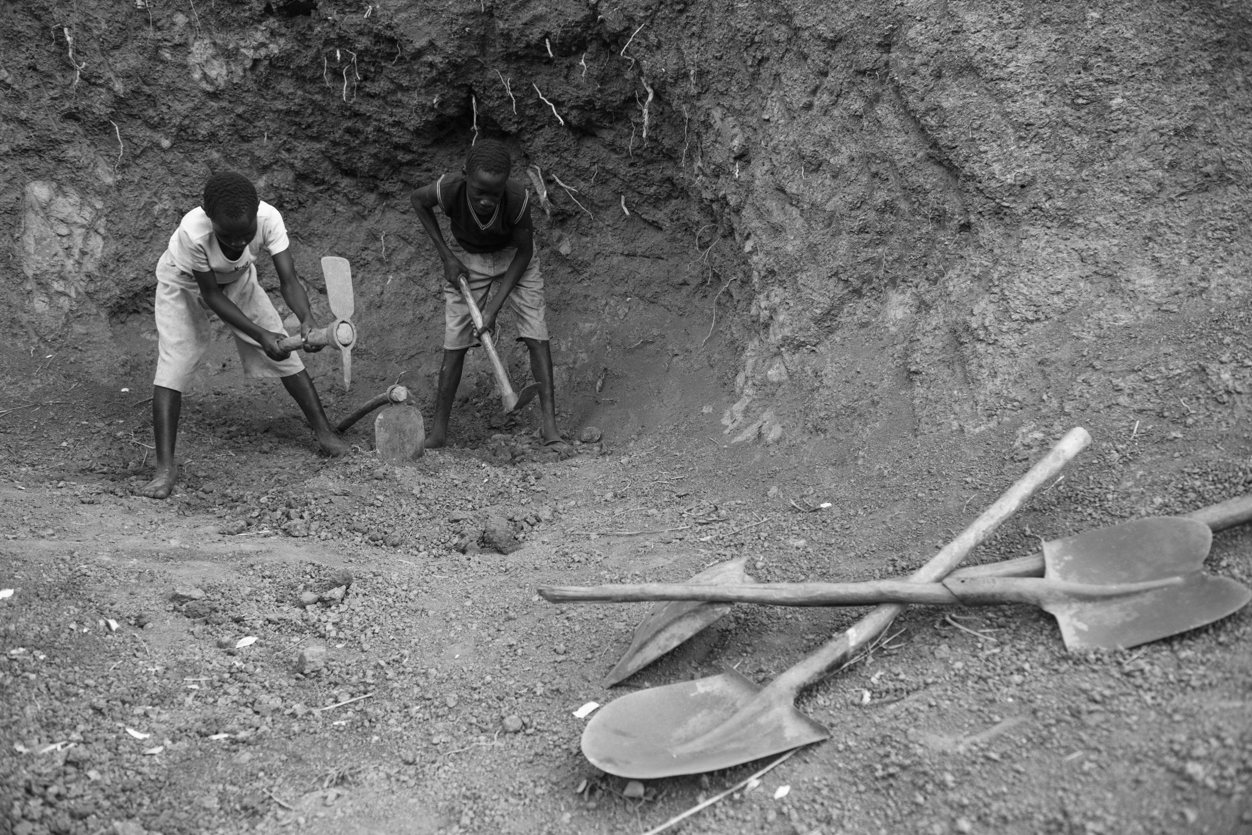 Soroti Uganda.
Children working in the bush. Many children have to work from a young age to earn money for their families.